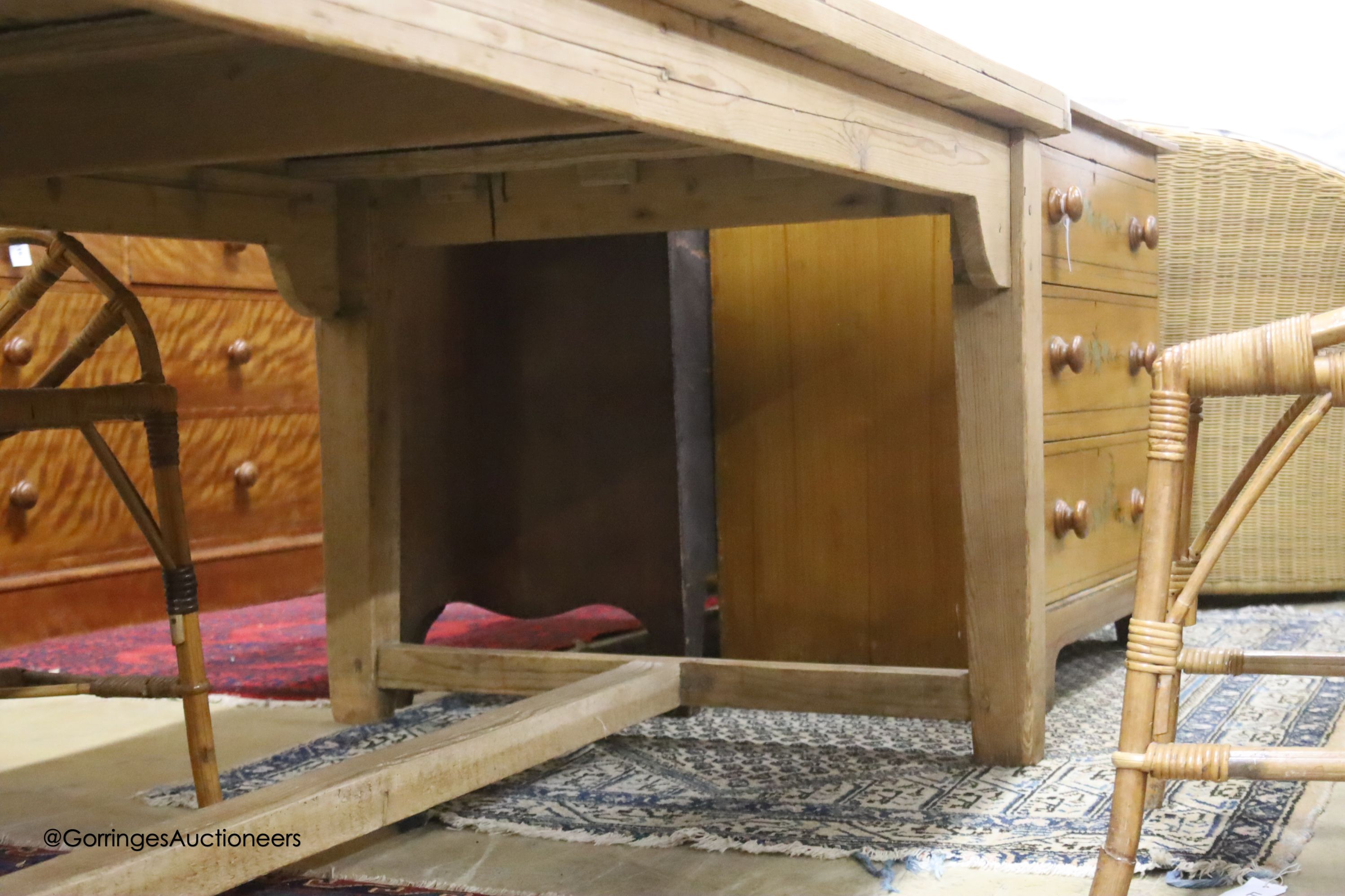 A 19th century rectangular pine plank top farmhouse kitchen table, length 211cm, depth 98cm, height 75cm